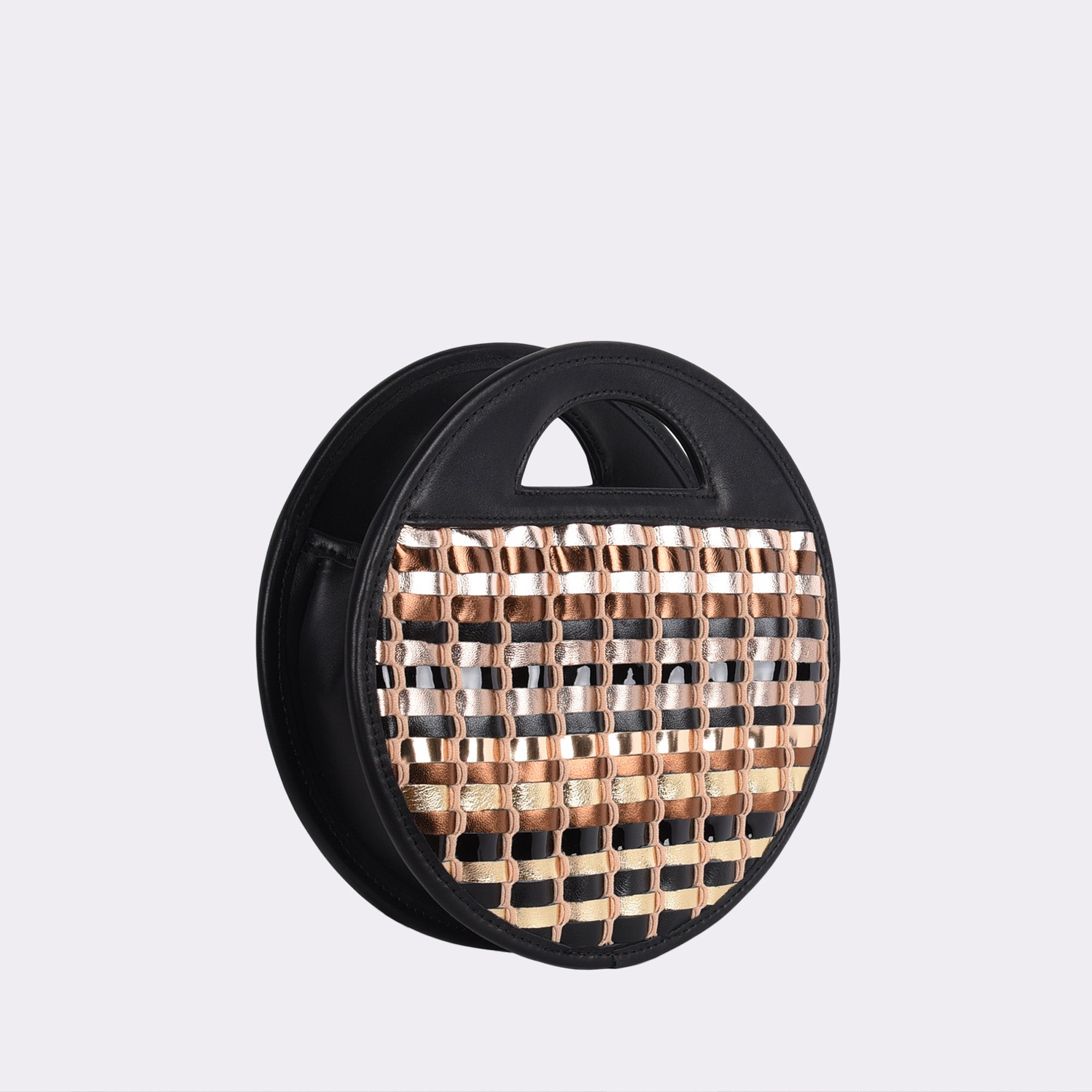 Picture of American made luxury top handle round crossbody bag with various neutral toned metallic handwoven leathers.