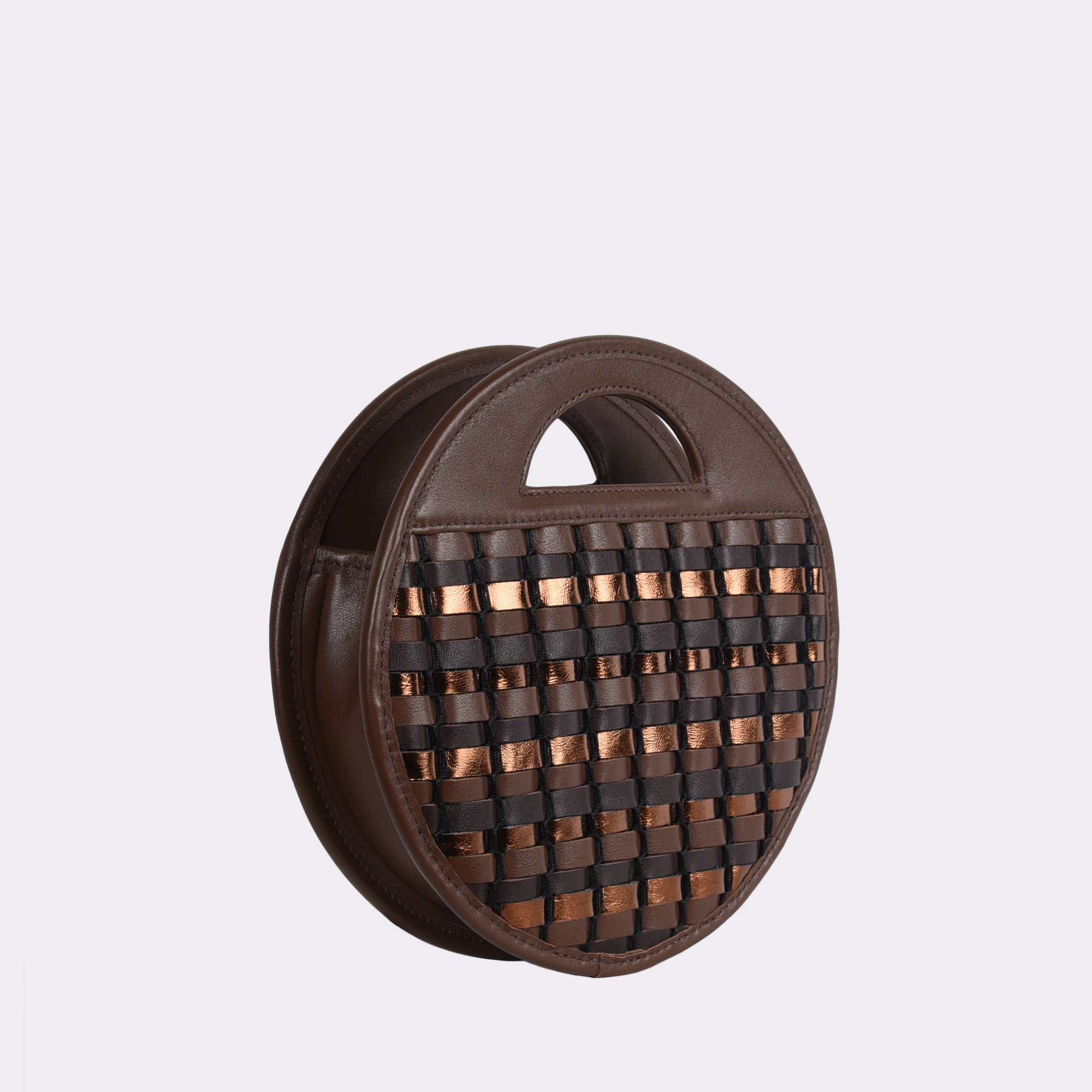 Picture of American made luxury top handle round crossbody bag with various brown and gold toned handwoven leathers.