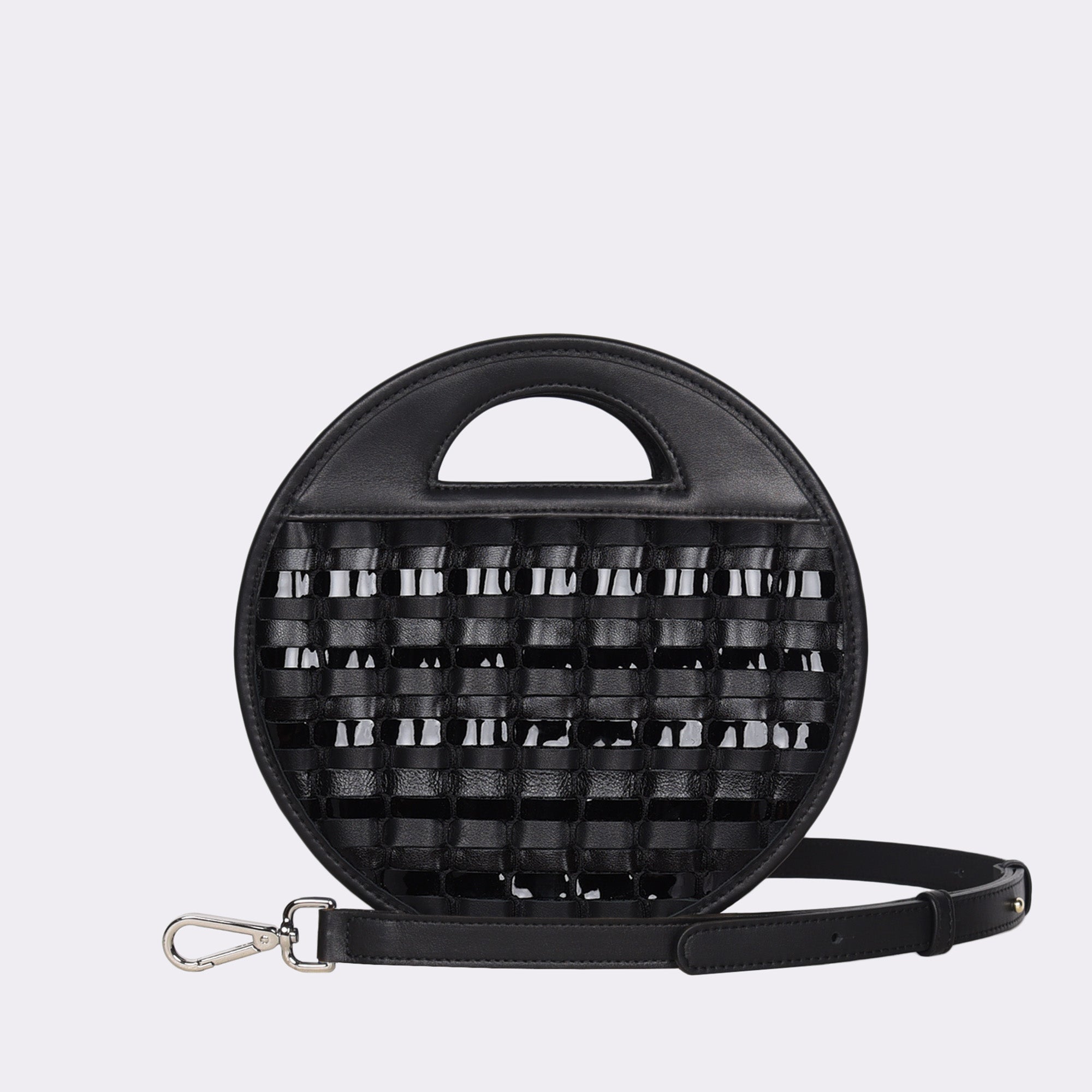 Picture of American made luxury top handle round crossbody bag with various matte and metallic black toned handwoven leathers.